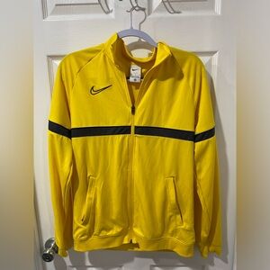 Nike dri fit zip up polyester jacket, size M, yellow and blue, good condition.